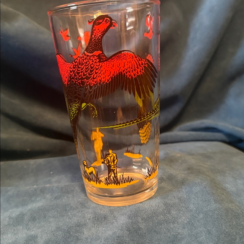 Vintage Glass duck hunting with Red and Yellow Bird Design